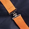 Load image into Gallery viewer, Kozy - 1200D Lite Rainsheet Combo - Navy/Orange - close-up of surcingle strap and hardware