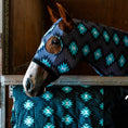 Load image into Gallery viewer, Kozy - Lycra Slinky Hood - Aztec/Turquoise - close-up on a horse with matching rug