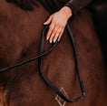 Load image into Gallery viewer, Lumiere Padded Nappa Leather Reins (Flat) - rider's hand holding the reins against a horse's neck
